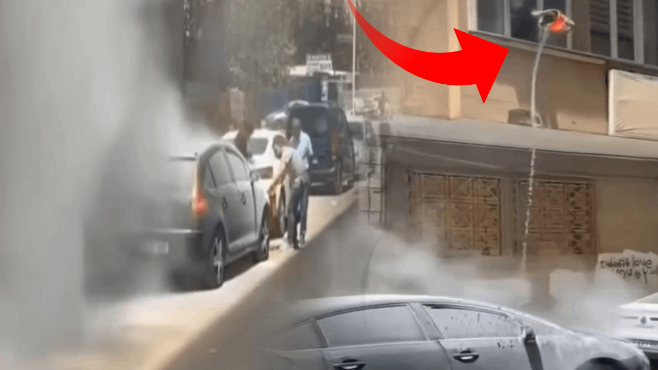 Yanan otomobili evinin penceresinden söndürmeye çalıştı Yanan otomobili evinin penceresinden söndürmeye çalıştı